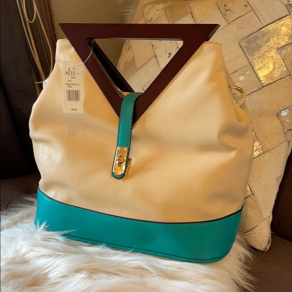 Nice hand bag with unique brown wood handle